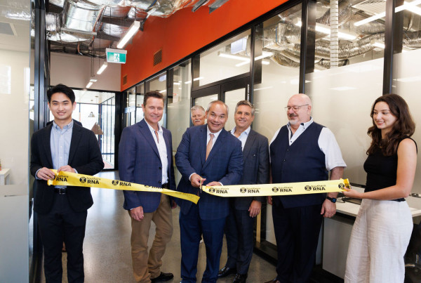 Gold Coast Mayor Tom Tate joins Southern RNA Managing Director Chris Peck, Providence Therapeutics leaders, and Gold Coast Health and Knowledge Precinct representatives to cut the ribbon at the official opening of Southern RNA’s new R&D laboratories at Cohort Innovation Space, marking a major milestone for biotech innovation on the Gold Coast.