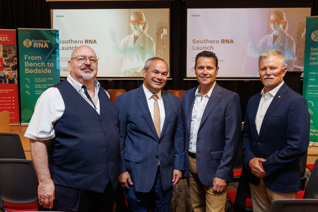 Providence Therapeutics Chief Medical Officer Dr Leon Rozen, Gold Coast Mayor Tom Tate, Southern RNA Managing Director Chris Peck, and patient advocate Ian Gillespie AM gather for a photo following the Southern RNA launch presentations