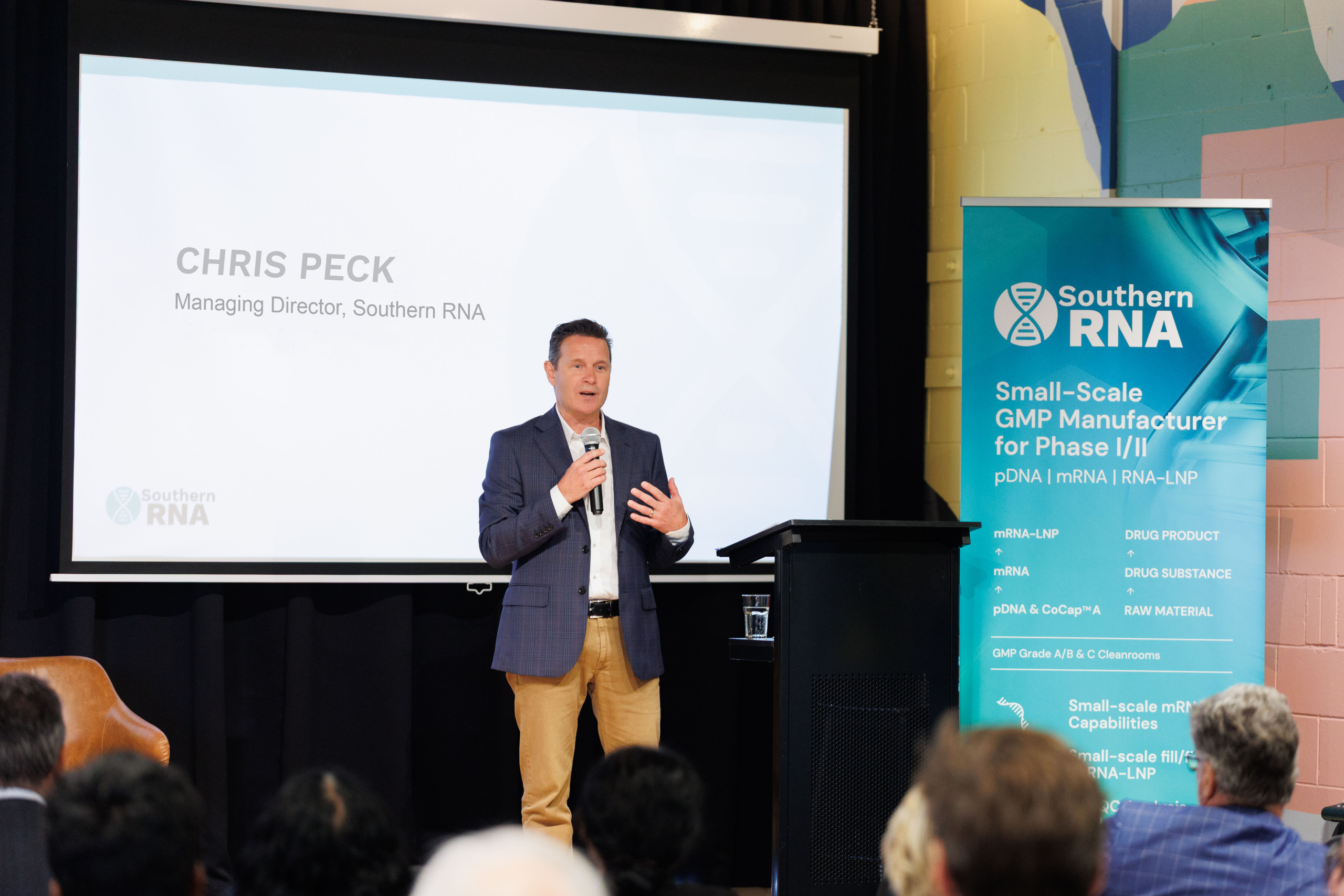 Southern RNA Managing Director Chris Peck speaks at the podium during the launch event at Cohort Innovation Space, introducing the company’s mission to advance mRNA-based therapies in Australia.