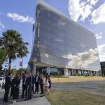 Delegates gathered outside the RDX building at the Gold Coast Health and Knowledge Precinct during a site tour.