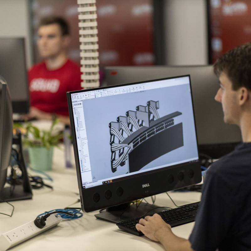 Engineer working on a computer designing a prototype model in a lab environment at Griffith University ADaPT Institute