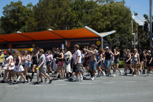 Festivalgoers walking along the street near Griffith University during Laneway Festival on the Gold Coast