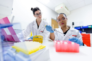 Clinical trial researchers in a Griffith University laboratory