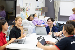 Health students working together in a classroom.
